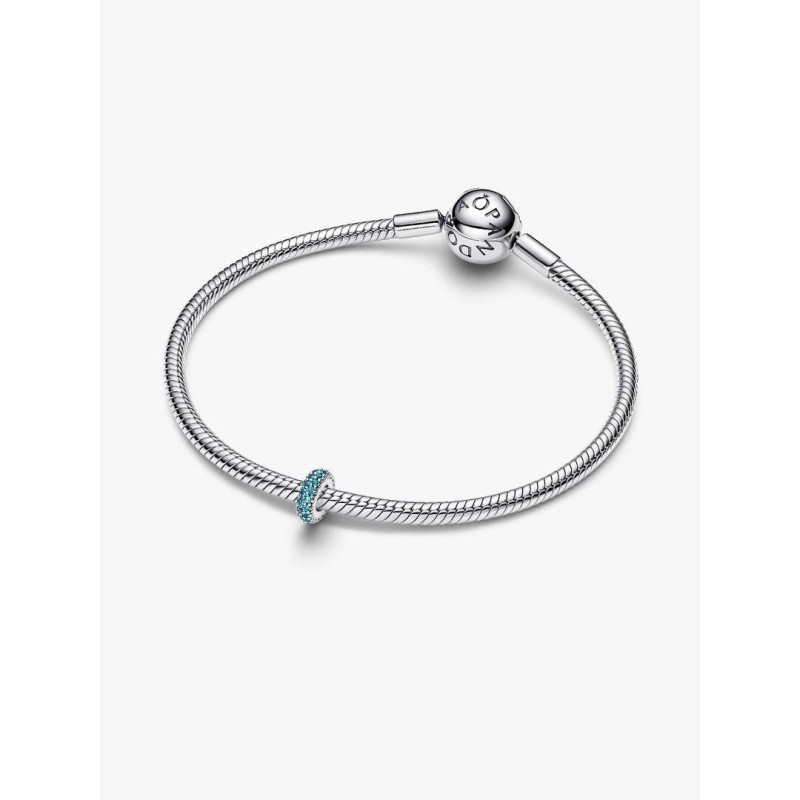 Abstract sterling silver spacer with icy blue crystal