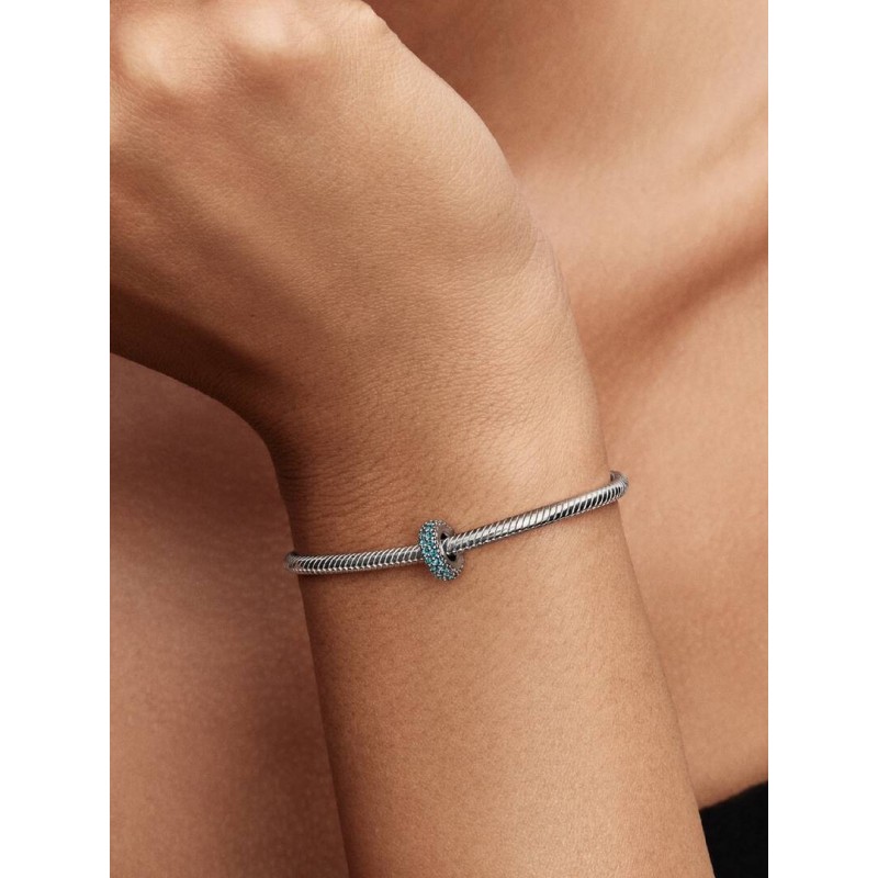 Abstract sterling silver spacer with icy blue crystal