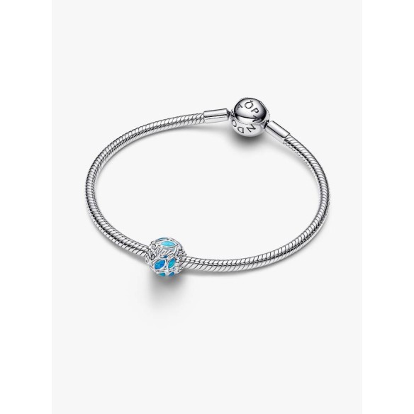 Openwork fish sterling silver charm with transparent blue enamel