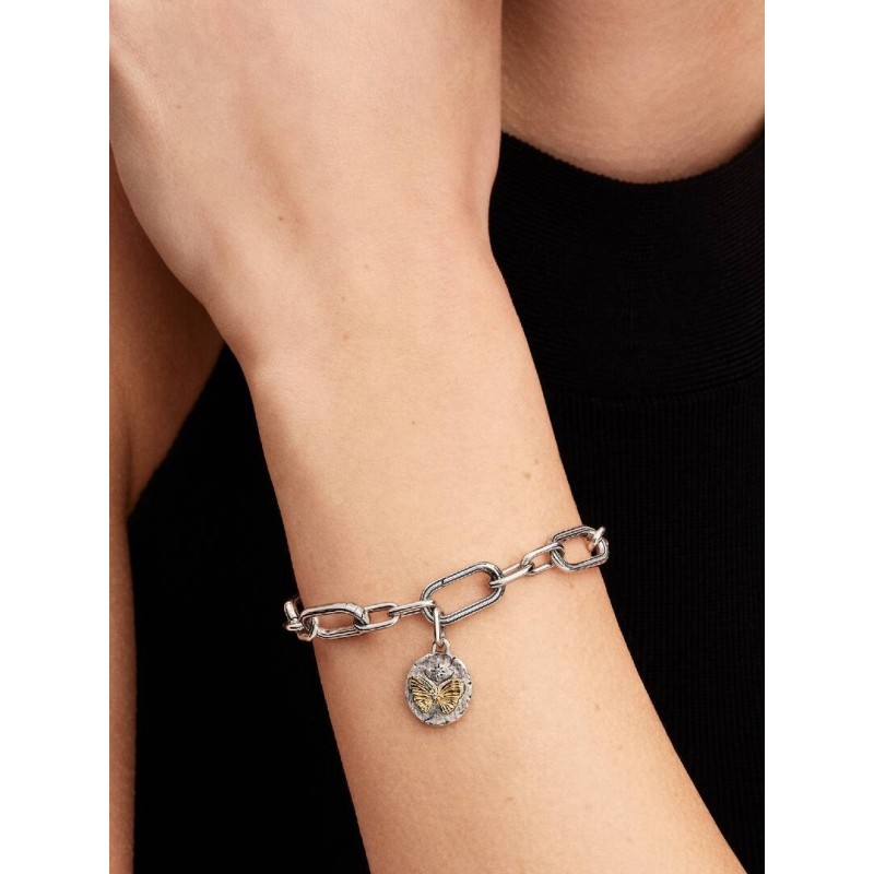 Butterfly sterling silver and 14k gold-plated medallion with clear cub