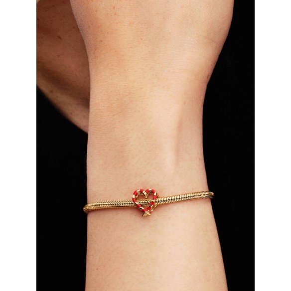 Openwork star 14k gold-plated charm with blue enamel